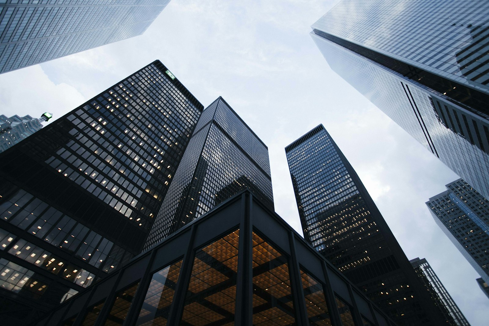 Glass office towers rising over a city financial district